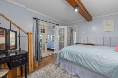 This charming two-story lake home offers stunning views and 1 - photo 10