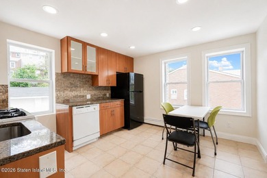 Welcome to 74 Targee Street! This fully renovated 2-family home - photo 12