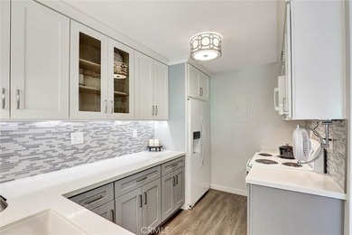 Welcome to this rare top-floor, end unit, fully remodeled 2 - photo 4