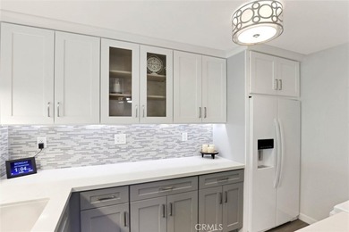 Welcome to this rare top-floor, end unit, fully remodeled 2 - photo 6
