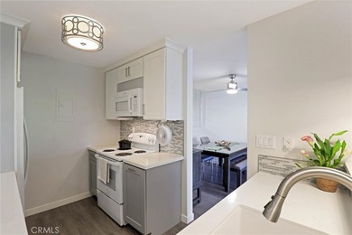 Welcome to this rare top-floor, end unit, fully remodeled 2 - photo 7