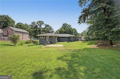 Step into this charming 4-bedroom, 2-bath brick beauty in Cobb - photo 21