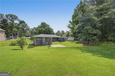 Step into this charming 4-bedroom, 2-bath brick beauty in Cobb - photo 22