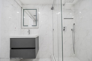 Welcome to 74 Targee Street! This fully renovated 2-family home - photo 26