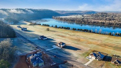 Imagine designing your home on this 2.2-acre lot with year-round - photo 4
