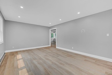 Welcome to 11 Mayfield Dr, Mastic Beach! This beautifully - photo 6
