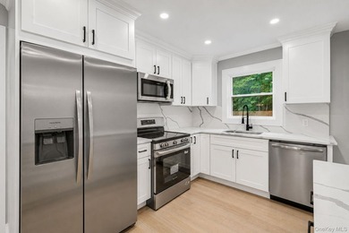 Welcome to 11 Mayfield Dr, Mastic Beach! This beautifully - photo 8