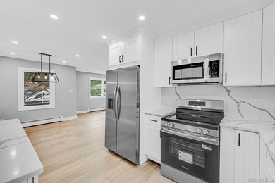 Welcome to 11 Mayfield Dr, Mastic Beach! This beautifully - photo 9