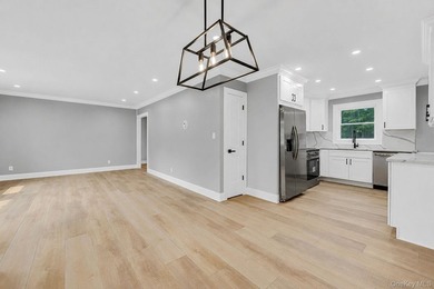 Welcome to 11 Mayfield Dr, Mastic Beach! This beautifully - photo 10