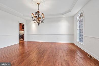 Freshly painted custom estate with a 3-car garage, offering an - photo 5