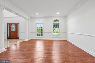 Freshly painted custom estate with a 3-car garage, offering an - photo 9