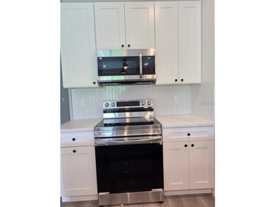 Virtually Staged. PRICED TO SELL.... Live Like You're on - photo 4