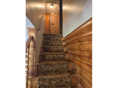 Discover tranquility & charm in this immaculate log cabin - photo 13