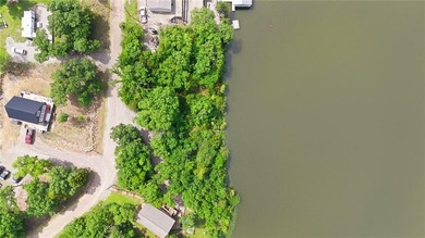 Build your dream home on this premium, Tier 1 waterfront lot at - photo 4