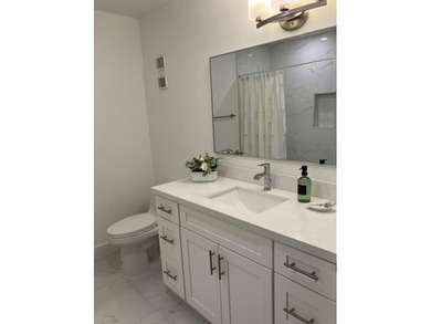Discover this distinctive 2-bedroom, 2-bath villa that feels - photo 8
