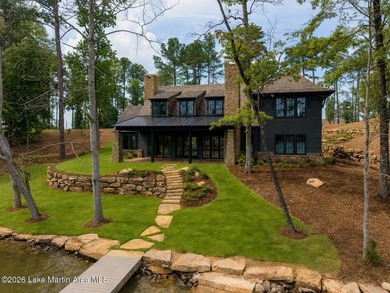 This new construction lake home offers five bedrooms and - photo 1