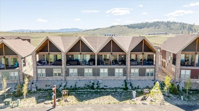 Overlooking Grand Elk Golf Course, this stunning fully furnished - photo 3
