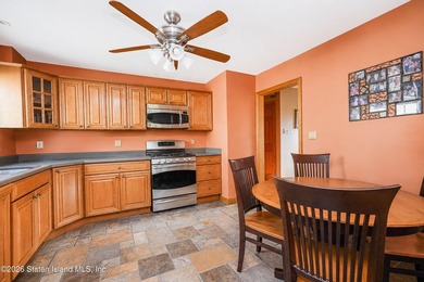 Located on a beautiful tree-lined block in the heart of - photo 12