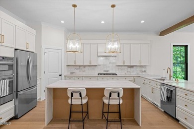 Like-new luxury in Durham's highly sought-after Treyburn - photo 13