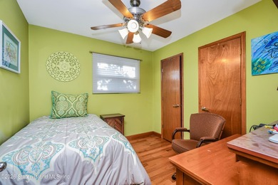 Located on a beautiful tree-lined block in the heart of - photo 17
