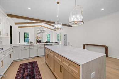 Like-new luxury in Durham's highly sought-after Treyburn - photo 17