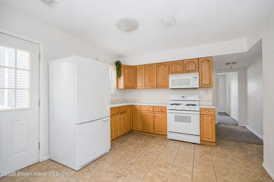 Located on a beautiful tree-lined block in the heart of - photo 19