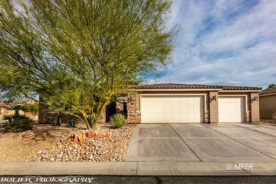 Corner lot with a beautiful home. The front walk way leads up to