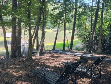 Rare offering! Affordable fully furnished lakefront retreat with - photo 14