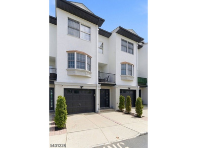 Thoughtfully updated, this spacious multi-level townhouse at - photo 2