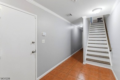 Thoughtfully updated, this spacious multi-level townhouse at - photo 4