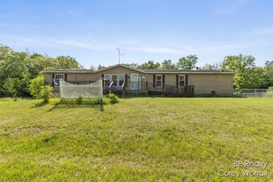 (private lake, pond, creek) Home Sale Pending in Howard City Michigan