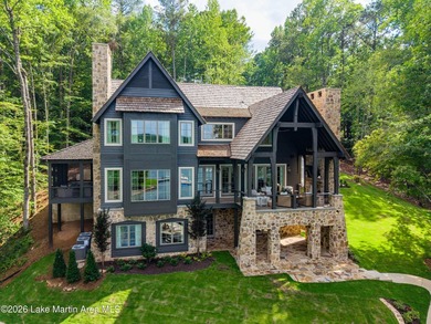 A rare opportunity to own a custom-crafted waterfront retreat in - photo 3