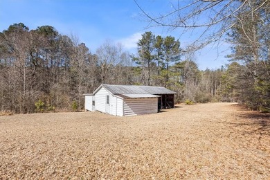 Discover the potential of this beautiful four-sided brick ranch