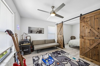 Fully renovated and just a 4-minute walk to the beach, this - photo 32