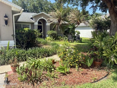 This three-bedroom, two-bathroom, waterfront home in the Waters - photo 3