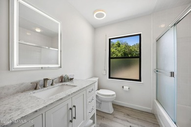 Fully renovated and just a 4-minute walk to the beach, this - photo 35