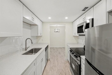 This 1 bedroom, 1 bathroom condo has been recently remodeled and - photo 3