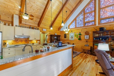 Escape to this beautifully crafted 2BR/2.5BA, 2.5-story cabin
