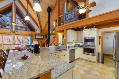 Escape to this beautifully crafted 2BR/2.5BA, 2.5-story cabin