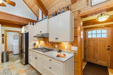 Escape to this beautifully crafted 2BR/2.5BA, 2.5-story cabin