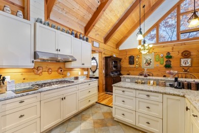 Escape to this beautifully crafted 2BR/2.5BA, 2.5-story cabin