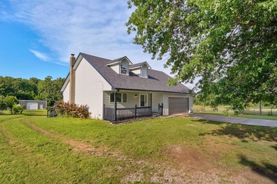 Escape to the country without sacrificing convenience! Nestled - photo 1