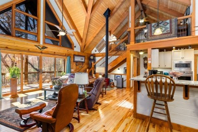 Escape to this beautifully crafted 2BR/2.5BA, 2.5-story cabin
