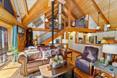 Escape to this beautifully crafted 2BR/2.5BA, 2.5-story cabin