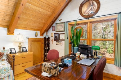 Escape to this beautifully crafted 2BR/2.5BA, 2.5-story cabin
