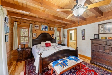 Escape to this beautifully crafted 2BR/2.5BA, 2.5-story cabin