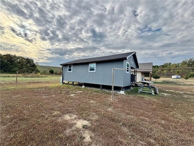 Discover your peaceful getaway at this beautiful new lake house! - photo 31