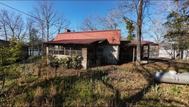 Escape to the lake with this 1BR/1BA cabin on an unrestricted - photo 1