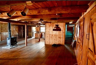 Escape to the lake with this 1BR/1BA cabin on an unrestricted - photo 3