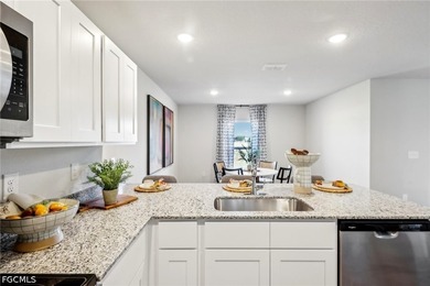 Welcome to our Prescott floor plan. The thoughtfully designed - photo 9